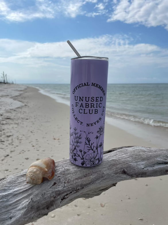 Unused Fabric Club. Shimmery Purple 20 oz skinny tumbler for fabric obsessed sewists and quilters