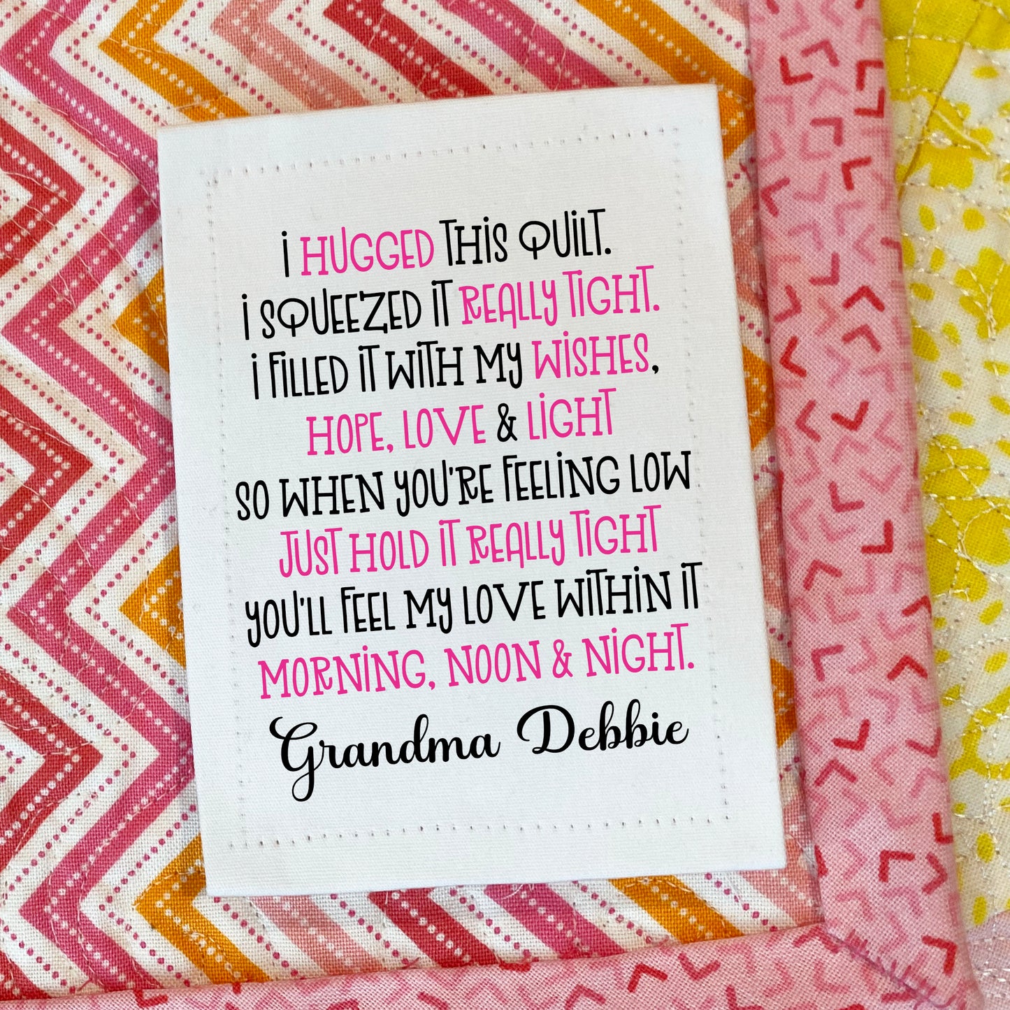 Personalized quilt label featuring “I Hugged This Quilt” poem with maker name, printed fabric quilt label for sewing onto handmade quilts