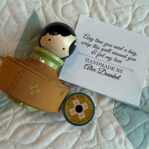 Anytime you need a hug, wrap this quilt around you and feel my love. Personalized sentimental quilt labels - Jammin Threads