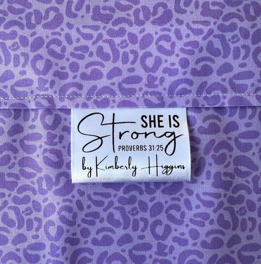 She is Strong. Proverbs 31:25 Christian Satin Labels and Tags - Jammin Threads
