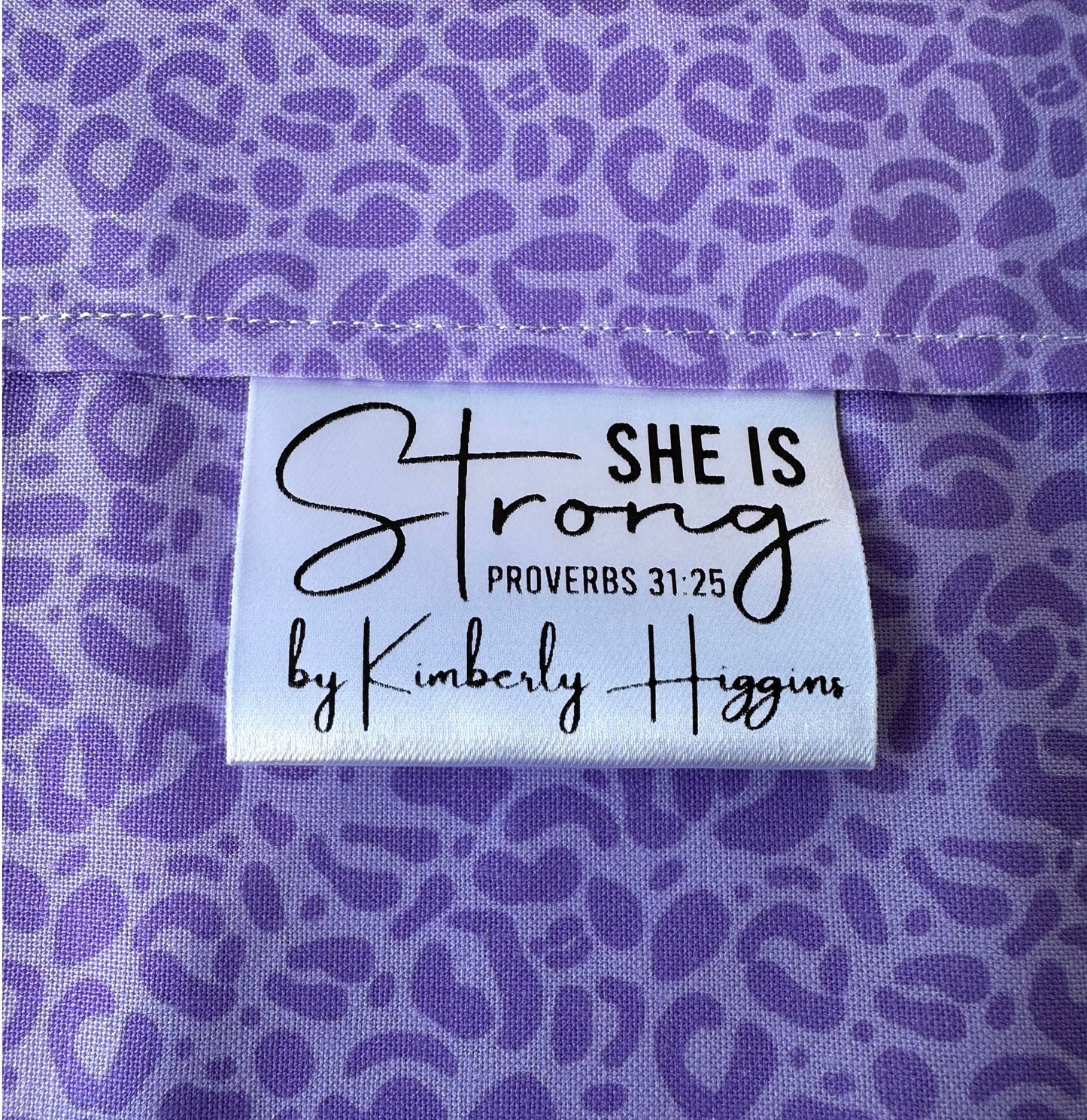 She is Strong. Proverbs 31:25 Christian Satin Labels and Tags - Jammin Threads