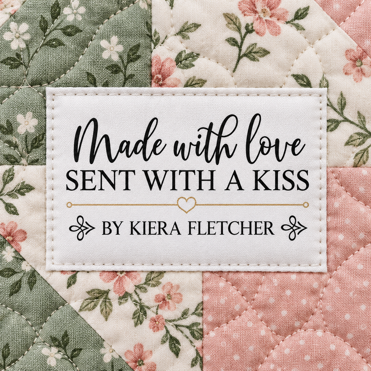 Personalized Made with Love Sent with a Kiss white cotton quilt label sewn onto the back of a handmade quilt with the maker's name.