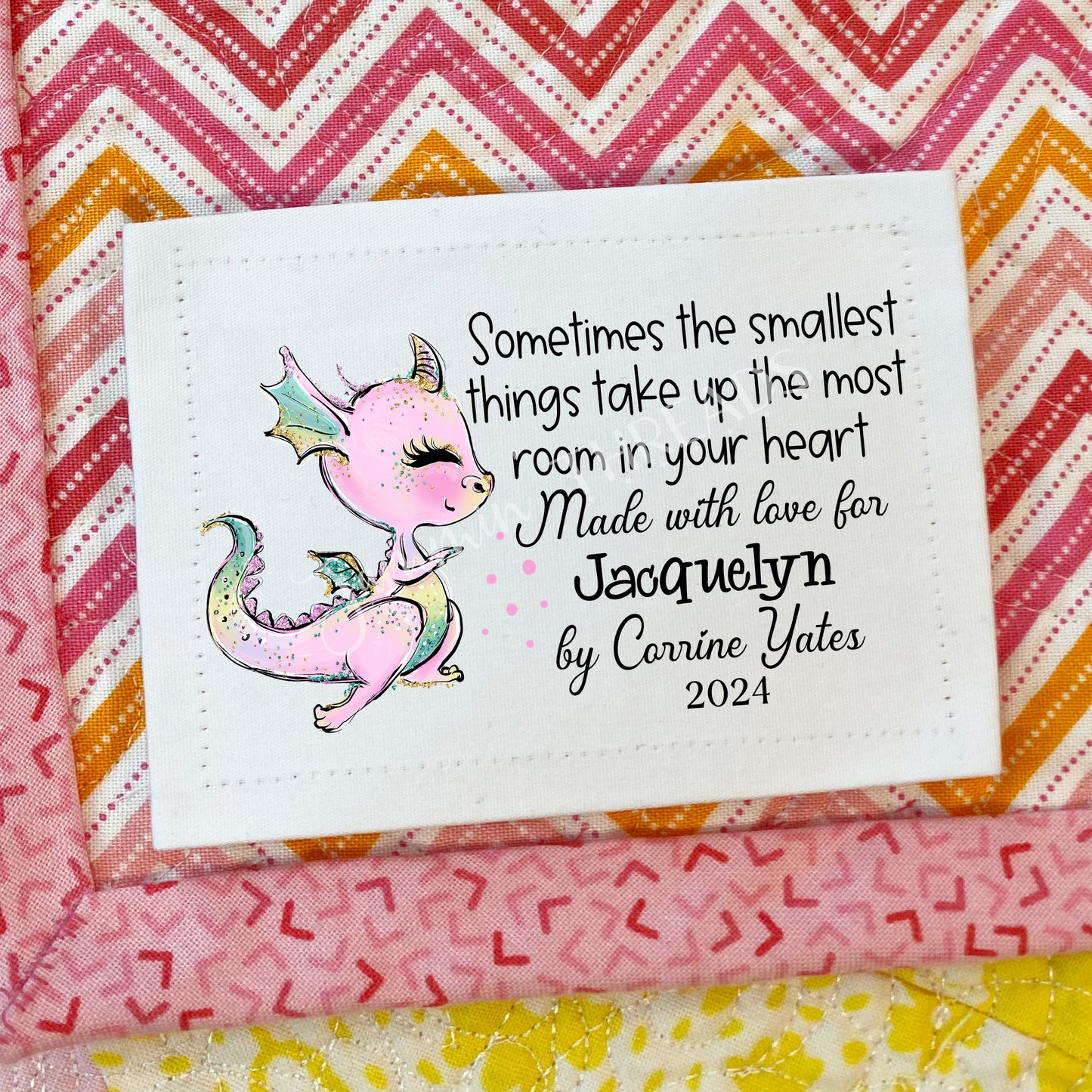 Cute Pink Dragon Quilt Label personalized for babies and kids.