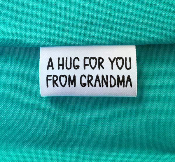 “A Hug for You” Tiny Personalized Satin Quilt Tag • 1" x 0.5" • Add Maker’s Name - Jammin Threads