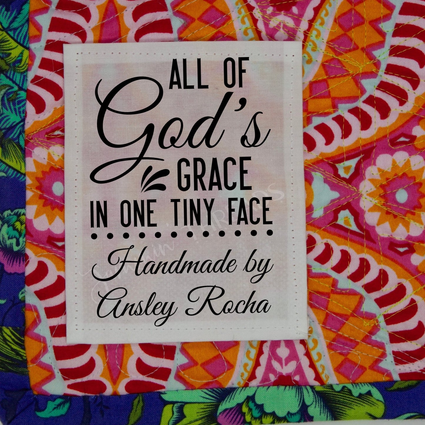 All God's Grace in One Tiny Face. Inspirational baby quilt labels - Jammin Threads