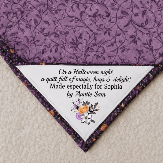 On a Halloween night, a quilt full of magic, hugs, and delight!. Corner Quilt Label - Jammin Threads