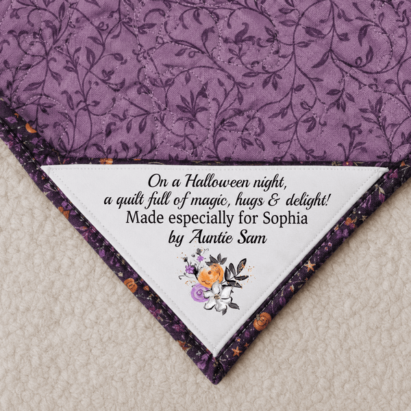 On a Halloween night, a quilt full of magic, hugs, and delight!. Corner Quilt Label - Jammin Threads