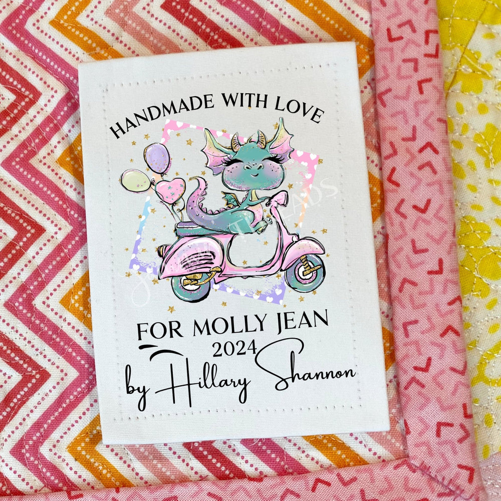 Personalized Kids Quilt Label with Pink Dragon Scooter Design - Jammin Threads