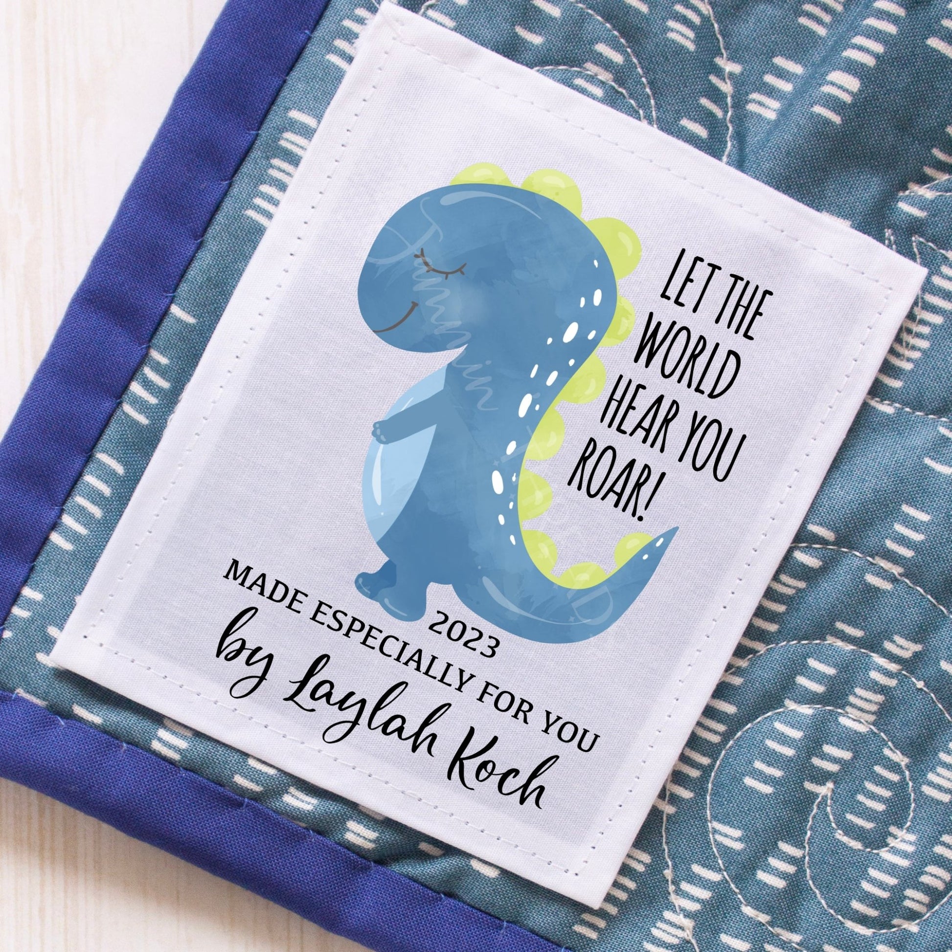 Let the World Hear You Roar. Personalized dinosaur baby quilt labels- Jammin Threads