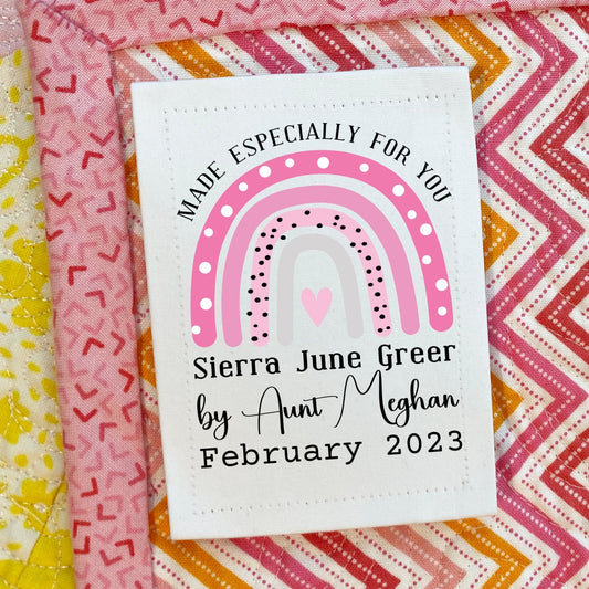 Custom baby girl quilt label in shades of pink customized with baby's name, a year and name of the mamer - Jammin Threads